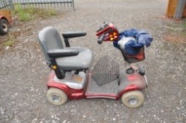 A STERLING MOBILITY SCOOTER (SPARE OR REPAIRS) with key and manual but NO CHARGER (no power lights