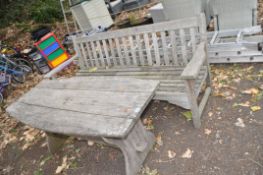 A HARDWOOD GARDEN BENCH AND TABLE bench width 180cm, table 152cm long, 69cm wide and 66cm high.