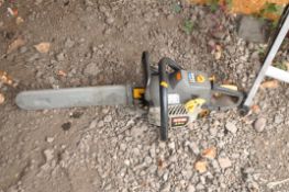 A RYOBI 35cc PETROL CHAINSAW with blade guard (engine pulls freely but hasn't been started)