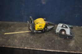 A MCCULLOCH VIRGINIA PETROL HEDGE TRIMMER (blade rusty) (engine pulls freely but hasn't started) and