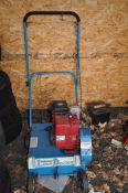 A BOB ANDREWS LAWN-DOCTOR AERATOR with a Briggs and Stratton petrol engine (Engine pulls freely