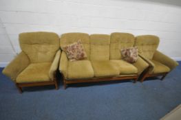 A TEAK FRAMED THREE PIECE LOUNGE SUITE, comprising a three seater sofa, length 178cm x depth 90cm