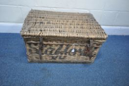 A VINTAGE WICKER BASKET, with a hinged lid, leather straps to the front, reading Stafford, width