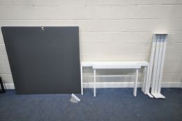 A LARGE IKEA RECTANGULAR TABLE, with two squared surfaces, raised on tubular metal legs, length