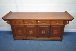 AN ORIENTAL STYLE SIDEBOARD, the top with raised ends, fitted with four drawers over four cupboard