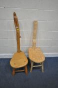 TWO HAND MADE SOLID WOOD CHAIRS, with slender backrests and low deep seats, tallest chair width 39cm