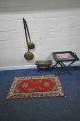 A 19TH CENTURY STOOL, a rug, two brass bed pans, and a folding tray table, condition report: stool