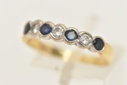 AN 18CT GOLD DIAMOND AND SAPPHIRE HALF ETERNITY BAND RING, set with three round brilliant cut