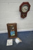 A 20TH CENTURY OAK AMERICAN WALL CLOCK, the glazed and painted door enclosing the movement, height