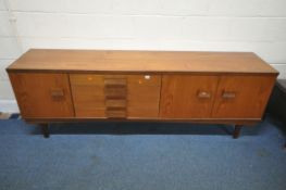 POSSIBLY B.C.M, BATH CABINET MAKERS, A MID-CENTURY TEAK 7FT SIDEBOARD, fitted with three cupboard
