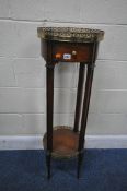 AFTER THEODORE ALEXANDER, A LOUIS XV STYLE TWO TIER PLANT STAND, each tier with a leather surface