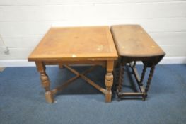 AN EARLY 20TH CENTURY OAK DRAW LEAF DINING TABLE, raised on block and turned legs, united by a cross