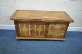 BARKER AND STONEHOUSE 'FLAGSTONE', A MANGO WOOD TV STAND, with geometric patterns, double cupboard