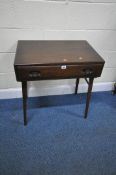 LUCIAN ERCOLANI A MID CENTURY DARK ELM AND BEECH WRITING DESK fitted with a single drawer raised