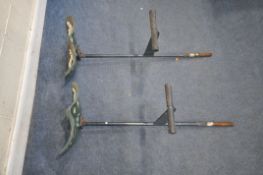 A PAIR OF 'PIERCE' PAINTED CAST IRON TRACTOR SEATS, raised on later stool supports, seat width