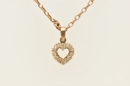 A 9CT GOLD HEART PENDANT NECKLACE, the open work heart set with colourless cubic zirconia, fitted
