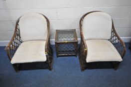 A PAIR OF BAMBOO EFFECT ARMCHAIRS, width 59cm x depth 75cm x height 77cm, along with a table with