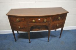 REDMAN & HALES Ltd, AN EDWARDIAN MAHOGANY BOWFRONT SIDEBOARD, fitted with two cupboard doors,