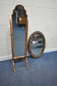 A QUEEN ANNE STYLE CHEVAL MIRROR, with an arched top, raised on square tapered supports, and splayed