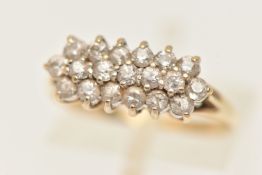 A 9CT GOLD GEM SET CLUSTER RING, designed as a three row cluster, set with circular cut cubic