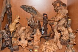 A LARGE COLLECTION OF POLISH FOLK CARVED SCULPTURES comprising approximately twenty sculptures of