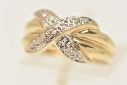 A 9CT GOLD GEM SET RING, designed as a yellow gold cross over band ring, grain set with five