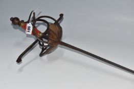 A SWEPT HILTED RAPIER, with double clam shell, fullered blade, red and gilt grip, indistinct marks