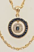 YELLOW METAL GEM SET NECKLACE, designed as an evil eye style pendant, set with blue sapphires and