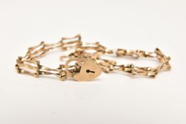 A 9CT GOLD GATE BRACELET, fitted with a heart padlock clasp, stamped 375, with additional safety