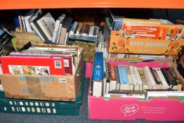 SEVEN BOXES OF BOOKS, approximately one hundred and eighty titles of hard back and paperback format,