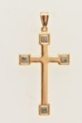 A YELLOW METAL CROSS PENDANT, fitted with a tapered bail, stamped 750, length including bail 44mm,