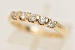 A 9CT GOLD DIAMOND RING, five round brilliant cut diamonds, interspaced with yellow gold,