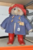 A GABRIELLE DESIGNS PADDINGTON BEAR SOFT TOY, wearing a blue felt duffle coat with red felt hat, and