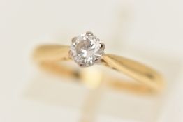 AN 18CT GOLD SINGLE STONE DIAMOND RING, a round brilliant cut diamond, approximate total carat