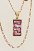 A YELLOW METAL RUBY AND DIAMOND SET PENDANT NECKLACE, the pendant of a rectangular Greek key pattern