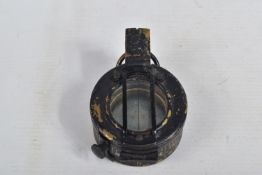 A BRITISH MARKED MILITARY ISSUE COMPASS, black painted with the correct markings as follows, EAC,
