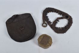 A VINTAGE BRASS NAUTICAL COMPASS AND WWI ERA FOLDING TRENCH SAW, the compass itself is in full