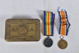 A WWI PAIR OF MEDALS AND A 1914 PRINCESS MARY TIN, the medals are both named to Private Sidney