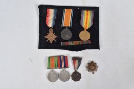 A WWI ROYAL WARWICKSHIRE TRIO OF MEDALS WWII PAIR OF MEDALS, CAP BADGE AND CORONATION MEDAL, the