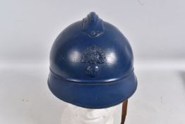 A FRENCH ADRIANNE WW1 COMBAT HELMET, in the darker blue colour which would indicate this was re-