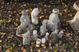 A SELECTION OF CONCRETE GARDEN ORNAMENTS, to include gnomes, owl, and two bird bath bases, condition