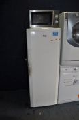 A BEKO TFF546APW LARDER FREEZER width 55cm, depth 56cm, height 145cm and a Cuisina microwave (both