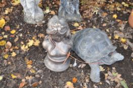 A PAINTED CONCRETE GARDEN ORNAMENT OF A TORTOISE, and a female garden bust, condition report: