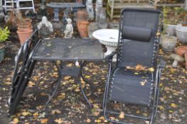 A PAIR OF METAL FOLDING SUN LOUNGERS, and a metal garden table, 71cm x height 73cm (3)