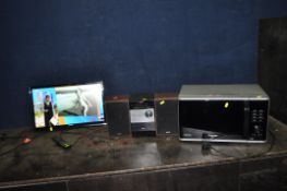 A HITACHI V18K21184 18in TV with remote partial wall bracket but no stand, a Sony mini Hi Fi and a