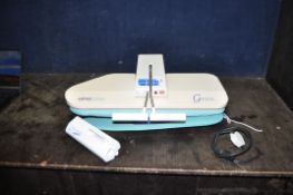 AN ELNA PRESS GENEVE CLOTHES PRESS with sleeve and Vap-o-Jet attachments (PAT pass and working but