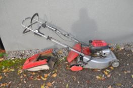 A MOUNTFIELD SELF PROPELLED PETROL LAWN MOWER with a Honda GCV160 engine and grassbox. Condition