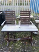 A PAINTED SLATTED GARDEN SET, including a pair of armchairs and a table, condition report: marks and