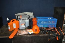 A TRAY CONTAINING STIHL ACCESSORIES AND PARTS including two harnesses, blades, strimmer string,