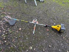 A McCULLOCH PETROL GARDEN STRIMMER, with a metal blade, condition report: engine pulls freely, but